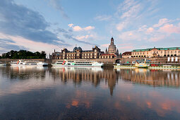 Morning mood, Bruehlsche Terrasse, Frauenkirche reflecting in the river Elbe, Dresden Saxony, Germany