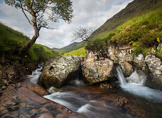 Waterfall in mountains, Argyll and Bute, Highland, Scotland, United Kingdom