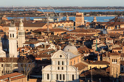 view above the roofs of Venice and the church of San Zaccaria and the Arsenale, lagoon, Venice, Italy