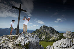 Urban golf players at Lacherspitz, Wendelstein, Upper Bavaria, Germany