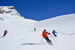 Several persons back-country skiing downhill from Kleiner Kaserer, Kleiner Kaserer, valley of Schmirn, Zillertal Alps, Tyrol, Austria