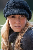 Young woman wearing black knitted cap, Bavaria, Germany