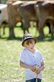 Boy holding a rope, Viehscheid, Allgau, Bavaria, Germany