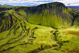 Aerial view of green mountains, river and glacier, Fjallabak, Highlands, South Iceland, Iceland, Europe
