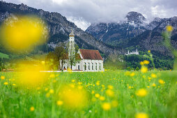 Church St. Coloman at Romantic Road with Saeuling and Castle Neuschwanstein in background, Ammergau Alps, Allgaeu, Swabia, Bavaria, Germany