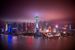 Huangpu River with Oriental Pearl Tower and Pudong skyline at night, Shanghai, Shanghai, Asia