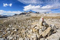 Cairn as marker on Pala plateau, Pala range, Dolomites, UNESCO World Heritage Dolomites, Trentino, Italy
