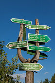 Signpost at a hiking trail at Schneekopf hill, nature park Thueringer Wald,  Thuringia, Germany
