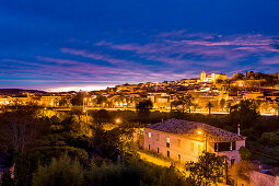 View towards old town, castle and cathedral at twilight, Silves, Algarve, Portugal