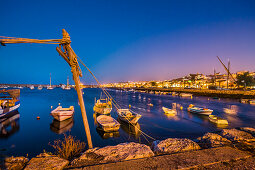 View from harbour towards old town at twilight, Lagos, Algarve, Portugal