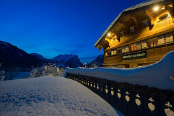 snow covered tavern at night, Schoppernau, Bregenz district, Vorarlberg, Austria