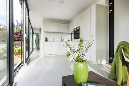 woman is walking in a modern apartment,modern architecture in Hamburg,north Germany,Germany