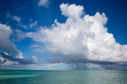 Rainbow above seawater at Meeru Island Resort, Meerufenfushi, North-Male-Atoll, Maldives