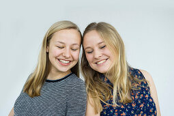 smiling young women, sisters, Germany