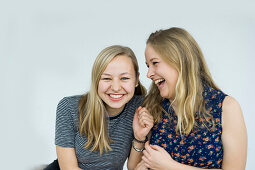 smiling young women, sisters, Germany