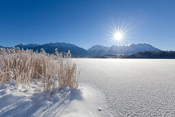 Winter landscape at Barmsee, view to Soiern range and Karwendel range, Bavaria, Germany