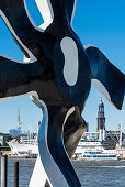 View at the Hamburg harbour with Michel and television tower in the background and a sculpture by Fernand Leger in the foreground, Hamburg, Germany