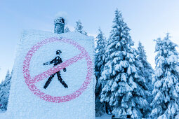 Iced sign no crossing, crystals, in a winter landscape, forest, fir trees covered with snow, mountains, dusk, winter sport, Ski area, Harz, MR, Sankt Andreasberg, Lower Saxony, Germany