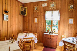 Historical dining room at hut rifugio Bedole, hut rifugio Bedole, Val Genova, Adamello-Presanella Group, Trentino, Italy