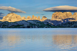 Mountain lake and mood of clouds above Brenta, lake lago Nero, Adamello-Presanella Group, Trentino, Italy