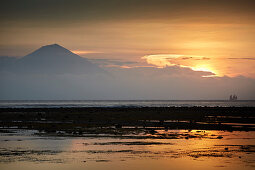 Sunset, view of Bali and the volcanoes Agung and Batur, Gili Trawangan, Lombok, Indonesia