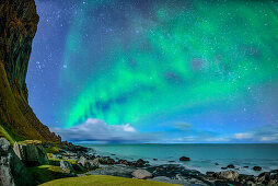 Aurora borealis, Aurora above beach and Northern Atlantic Ocean, Lofoten, Norland, Norway