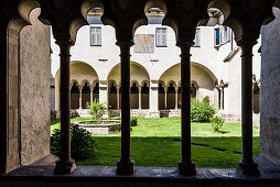 View from the cloister to the inner courtyard in the Franciscan cloister, Bolzano, South Tyrol, Italy