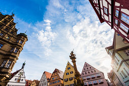 Houses and the market fountain at the town hall square, Rothenburg ob der Tauber, Bavaria, Germany
