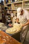 pastry for focaccia being made in restaurant Tortuga, Genoa, Liguria, Italy