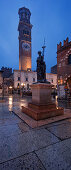 Market square Piazza delle Erbe in the old town of Verona with the bronze statue Civilta Italica and the Torre dei Lamberti, Veneto, Italy