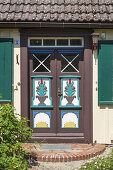 Traditional front door of an old captain's house in the Baltic seaside resort Prerow, Fischland-Darss-Zingst, Baltic coast, Mecklenburg-Western Pomerania, Northern Germany, Germany, Europe