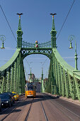 Tram on Szabadsag Hid (Liberty Bridge), Budapest, Hungary