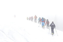 Winter landscape, People on a ski tour in fog, Kleinwalsertal, ski tour, Ifen, Austria