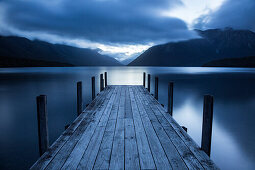 Kerr Bay and wooden jetty at dusk, Lake Rotoiti, Nelson Lakes National Park, South Island, New Zealand, Oceania