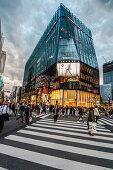 Crossing with pedestrians at Tokyu Plaza Ginza on a cloudy day, Ginza, Chuo-ku, Tokyo, Japan