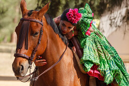 Horse rider, woman, El Rocio pilgrimage, Pentecost festivity, Huelva province, Sevilla province, Andalucia, Spain, Europe