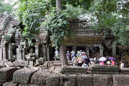 masses of tourists at Ta Prohm temple, Angkor Wat, Sieam Reap, Cambodia