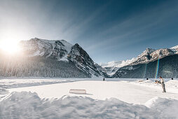 man playing ice hockey at Lake Louise, Bow Valley, Banff National Park, Alberta, Kanada, north america