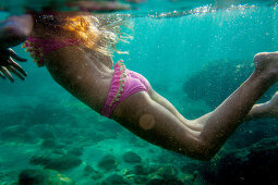 nine yeares old girl swimming with the mask, Cala s’Almunia, Mallorca, Balearic Islands, Spain