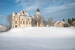 UNESCO World Heritage Wies Church, pilgrimage church surrounded by snow, Steingaden, Bavaria, Germany