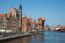 Kayak on Motawa river with old town buildings, Gdansk, Pomerania, Poland