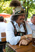 A member of the regular's table at the beer garden at the Viktualien Market in Munich, Bavaria