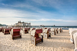 Sellin Pier and beach chairs in backlight, Sellin, Ruegen Island, Mecklenburg-Western Pomerania, Germany