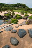 A zen garden invites the visitor to stroll through its serenely balanced beauty, Sakaiminato, Tottori, Japan, Asia