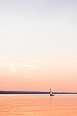 Lonely Yacht at the Sunset at the Ammersee lake