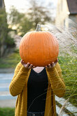 Children with pumpkin on Halloween, Hamburg, Germany