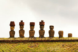 EASTER ISLAND, CHILE, Isla de Pascua, Rapa Nui, the Ahu Nao-Nao Moai statues on the Anakena white coral beach in Rapa Nui National Park