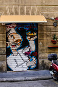 Graffiti on the door of la raffineria, restaurant in Livorno, Italy, Europe