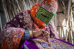 Bandari woman with traditional mask, Persian Gulf, Iran, Asia