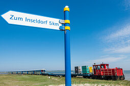 Island railway at the entrance to the harbour jetty, Wangerooge, East Frisia, Lower Saxony, Germany